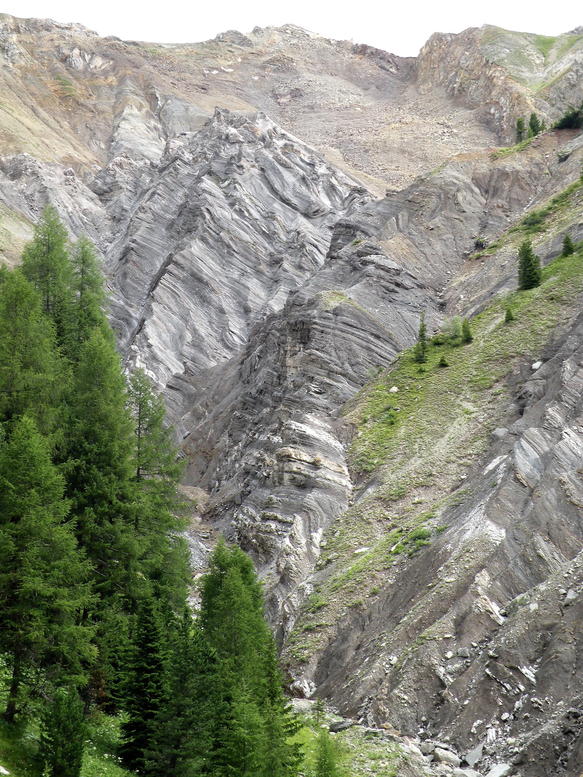 Permian evaporite rocks of the Bellerophon Formation pushed upward trough the nucleus of a diapiric anticline. (Dolomites, Southern Alps)